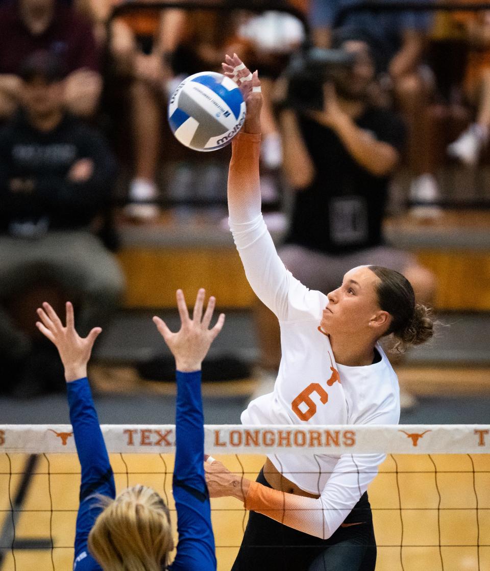 Texas outside hitter Madisen Skinner hammers a kill in an exhibition match against Texas A&M-Corpus Christi Aug. 18. The Longhorns fell from No. 1 to No. 7 in the latest AVCA poll after splitting their first two games of the season, and they will face No. 5 Minnesota on Tuesday.