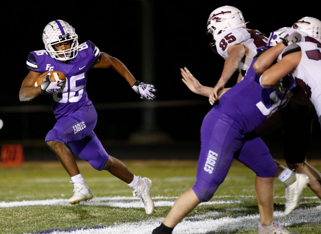 Fair Grove's Kellen Lair carries ht eval during the district championship game against visiting Strafford on Friday, Nov. 10, 2023.