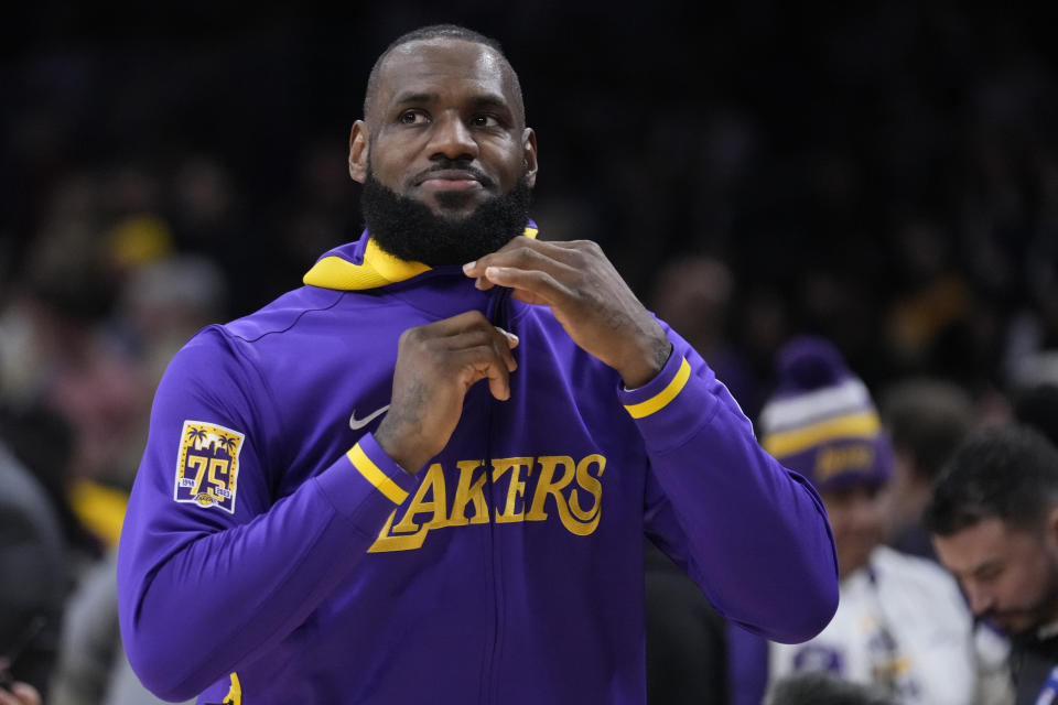 Los Angeles Lakers' LeBron James warms up before an NBA basketball game against the Chicago Bulls, Sunday, March 26, 2023, in Los Angeles. (AP Photo/Marcio Jose Sanchez)