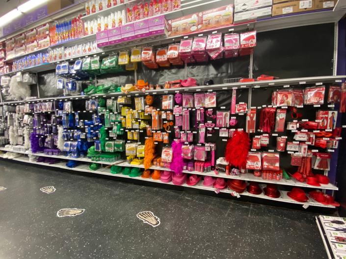 The color coded section filled with hats and wigs at Party City