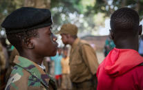 <p>Newly released child soldiers wait in a line for their registration during the release ceremony in Yambio, South Sudan on Feb. 7, 2018. (Photo: Stefanie Glinski/AFP/Getty Images) </p>