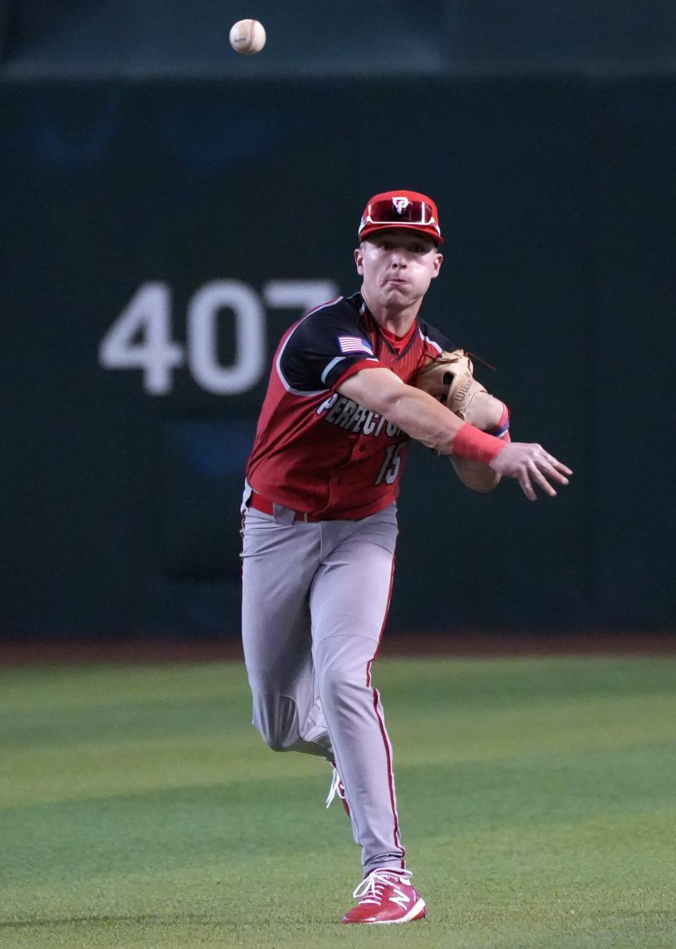 West Squad's Kevin McGonigle throws the ball in to first base during the Perfect Game All-American Classic at Chase Field on Sunday, Aug. 28, 2022.