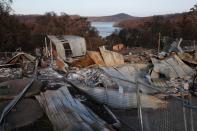 The remnants of a destroyed home, burnt in the recent bushfires, is pictured in Conjola Park