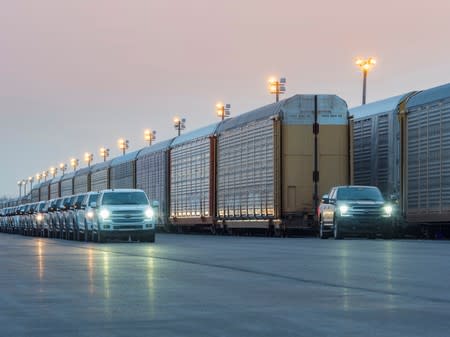 An all-electric Ford F-150 prototype tows more than 1.25 million pounds of rail cars and trucks during a test in Dearborn