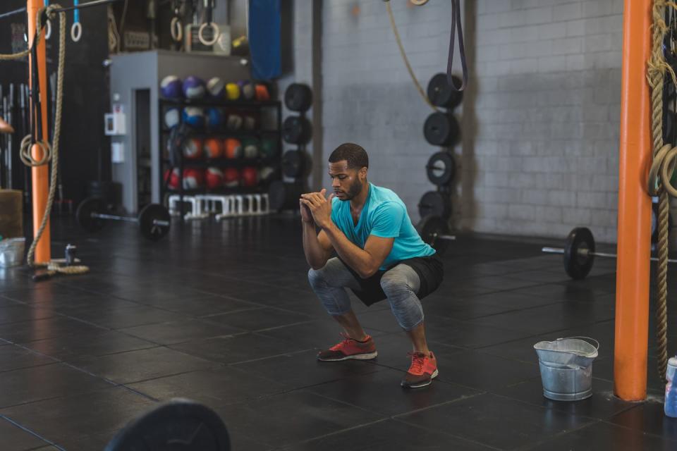 african american male working out in a gym