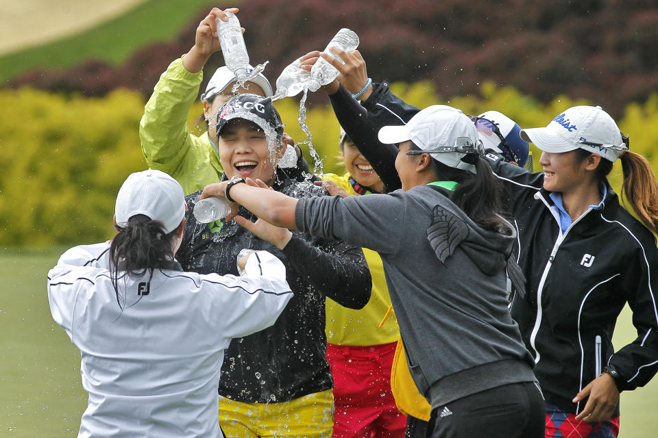 <p>Ariya Jutanugarn, of Thailand, is doused with water after winning the Kingsmill Championship golf tournament in Williamsburg, Va., May 22, 2016. (Jonathon Gruenke/The Daily Press via AP) </p>