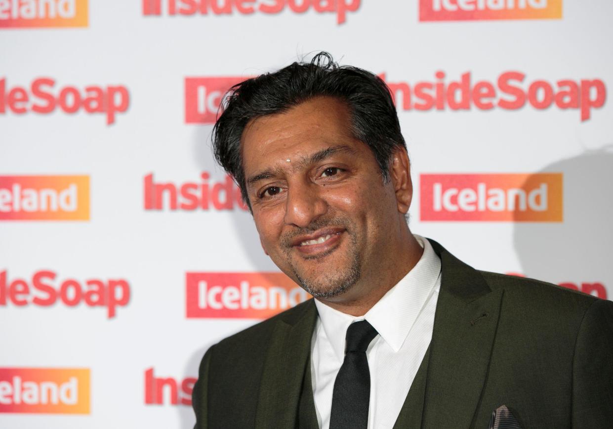 British actor Nitin Ganatra arrives for the Inside Soap awards, held in central London, Wednesday, Oct. 1, 2014. (Photo by John Phillips Invision/AP Images)