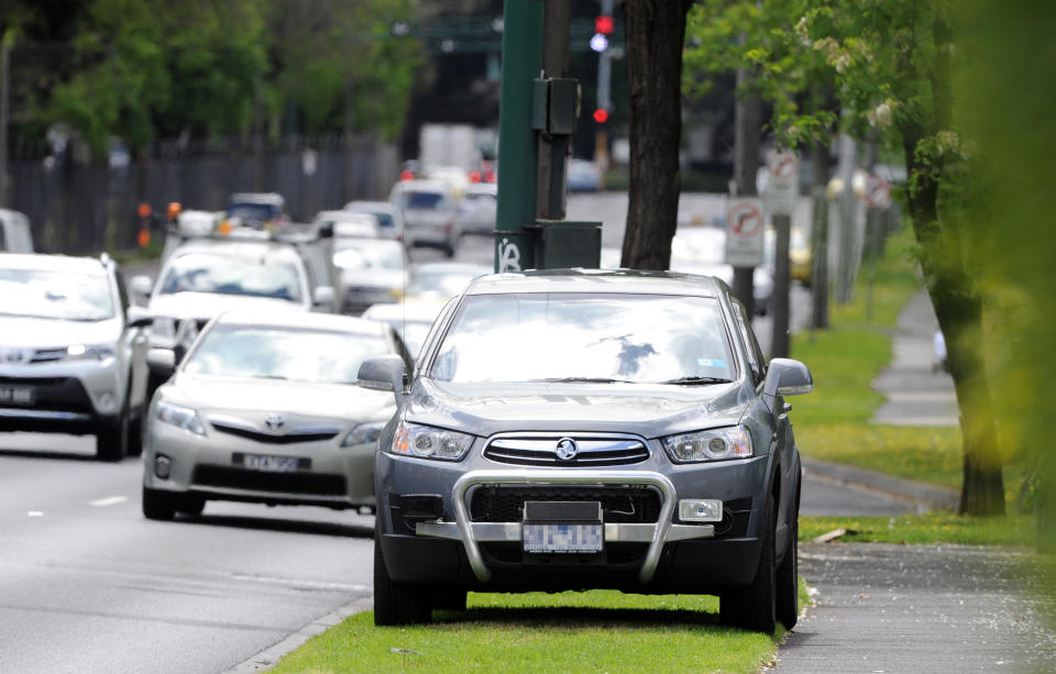 Cars pictured driving along a Melbourne road where a speed camera is positioned.