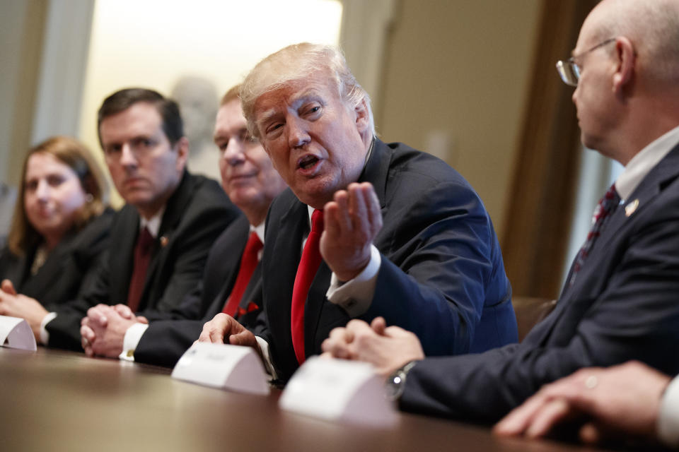 President Donald Trump speaks during a meeting with steel and aluminum executives in the Cabinet Room of the White House, Thursday, March 1, 2018, in Washington. From left, Beth Ludwig of AK Steel, Roger Newport of AK Steel, John Ferriola of Nucor, Trump, and Dave Burritt of U.S. Steel Corporation. (AP Photo/Evan Vucci)