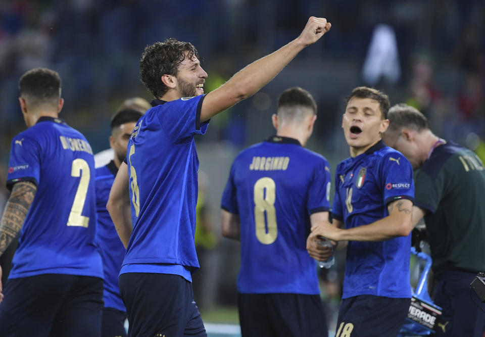 Italy's Manuel Locatelli celebrates after scoring his side's opening goal during the Euro 2020 soccer championship group A match between Italy and Switzerland at Olympic stadium in Rome, Wednesday, June 16, 2021. (Ettore Ferrari, Pool via AP)