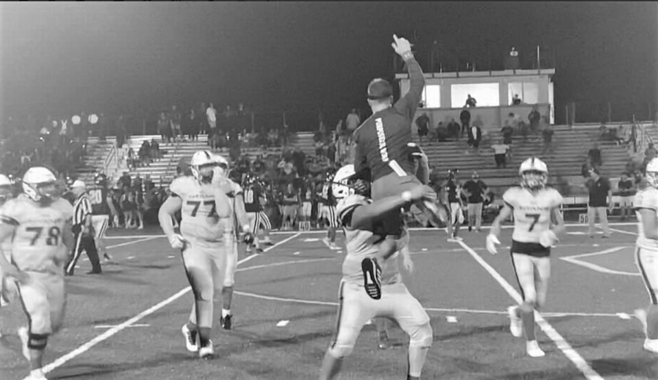 The True North Classical Academy football team celebrate a come-from-behind win over Mater Academy.