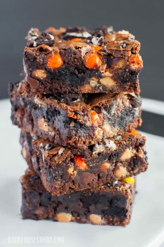 <p>Back for Seconds</p><p>These homemade Oreo Reese’s Fudge Brownies are thick, rich and fudgy— just the way a brownie should be! </p><p><strong>Get the recipe: </strong><strong><a href="https://backforseconds.com/oreo-reeses-fudge-brownies/" rel="nofollow noopener" target="_blank" data-ylk="slk:Oreo Reese's Fudge Brownies;elm:context_link;itc:0;sec:content-canvas" class="link rapid-noclick-resp">Oreo Reese's Fudge Brownies</a></strong></p><p><strong>Related: <a href="https://parade.com/1274738/kavitharamaswamy/squid-game-dalgona-candy-recipe/" rel="nofollow noopener" target="_blank" data-ylk="slk:Easy Squid Game Honeycomb Recipe (Dalgona Candy);elm:context_link;itc:0;sec:content-canvas" class="link rapid-noclick-resp">Easy Squid Game Honeycomb Recipe (Dalgona Candy)</a></strong></p>