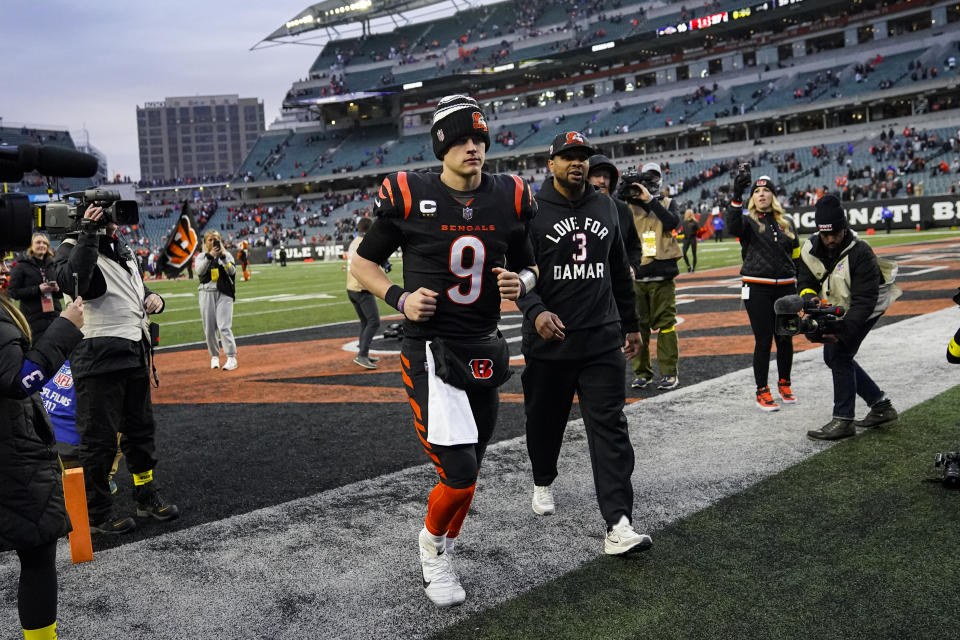 Cincinnati Bengals quarterback Joe Burrow (9) runs off the field following an NFL football game against the Baltimore Ravens in Cincinnati, Sunday, Jan. 8, 2023. The Bengals defeated the Ravens 27-16. (AP Photo/Joshua A. Bickel)