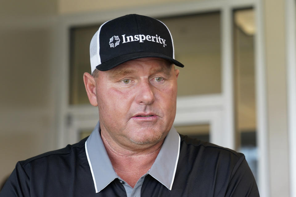 Roger Clemens, seven-time Cy Young Award winning pitcher, talks about his son Kody Clemens, who is to make his debut with the Detroit Tigers in the major leagues against the Minnesota Twins in Detroit, Tuesday, May 31, 2022. (AP Photo/Paul Sancya)