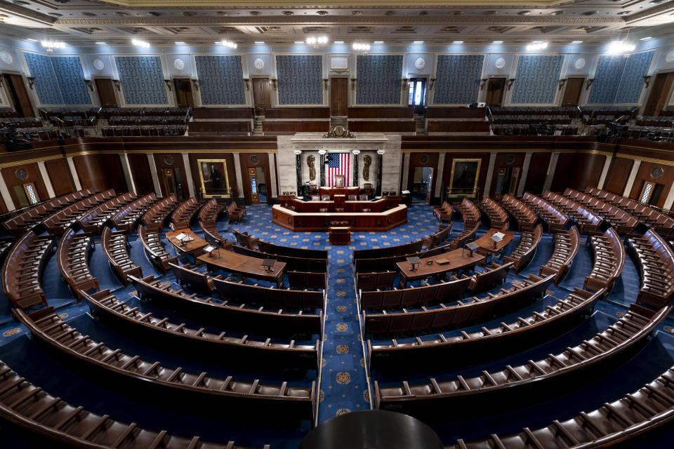 FILE - The chamber of the House of Representatives is seen at the Capitol in Washington, Feb. 28, 2022. The House will convene Tuesday, Jan. 3, 2023, to elect a speaker for the new Congress. The majority of the Republican conference plans to nominate Kevin McCarthy to lead them as they take over control of the chamber. Many are skeptical that McCarthy will reach a majority to become speaker on the first ballot. (AP Photo/J. Scott Applewhite, File)