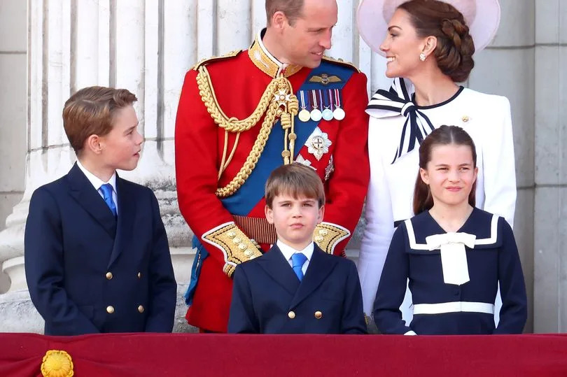 Prince George of Wales, Prince William, Prince of Wales, Prince Louis of Wales, Catherine, Princess of Wales and Princess Charlotte of Wales on the balcony during Trooping the Colour