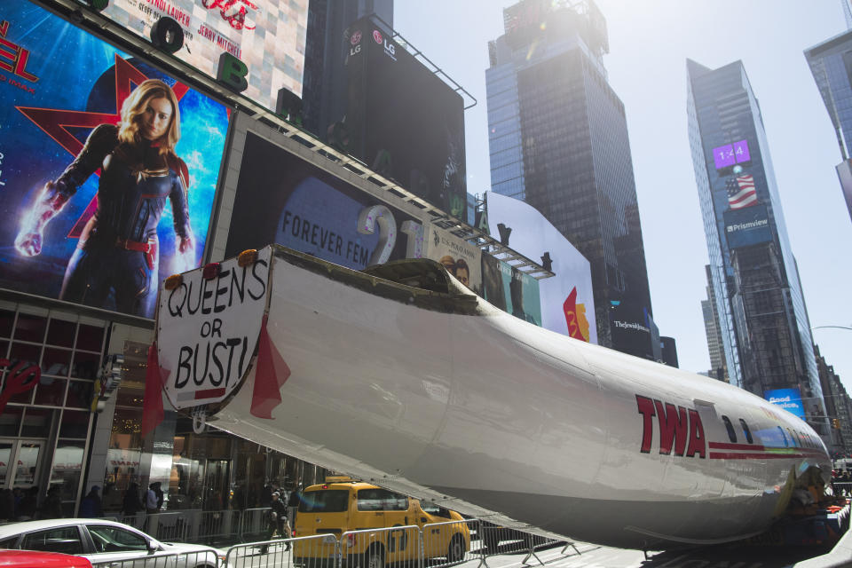 A Lockheed Constellation L-1649A Starliner, known as the "Connie, is parked in New York's Times Square during a promotional event, Saturday, March 23, 2019, in New York. The vintage commercial airplane will serve as the cocktail lounge outside the TWA Hotel at JFK airport. (AP Photo/Mary Altaffer)