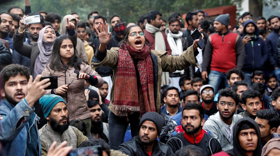A student of the Jamia Millia Islamia university reacts during a demonstration after police entered the university campus on the previous day, following a protest against a new citizenship law, in New Delhi, India, December 16, 2019. (Photo by REUTERS/Adnan Abidi)