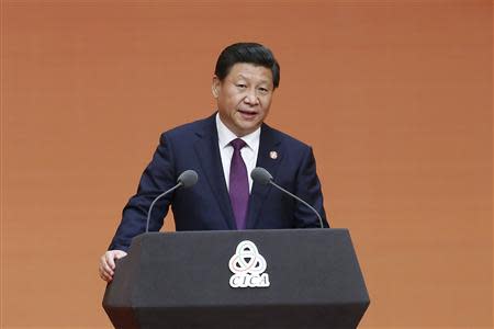 Chinese President Xi Jinping gives a speech during a gala dinner ahead of the fourth Conference on Interaction and Confidence Building Measures in Asia (CICA) summit, in Shanghai May 20, 2014. REUTERS/Aly Song