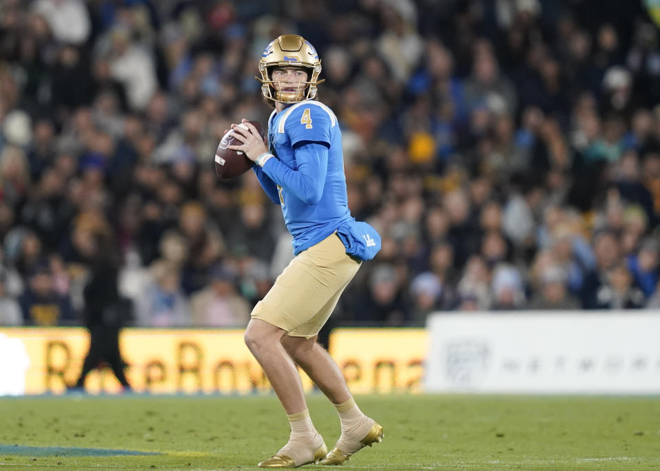 UCLA quarterback Ethan Garbers surveys the field during the first half of the team's NCAA college football game against California, Saturday, Nov. 25, 2023, in Pasadena, Calif. (AP Photo/Ryan Sun)