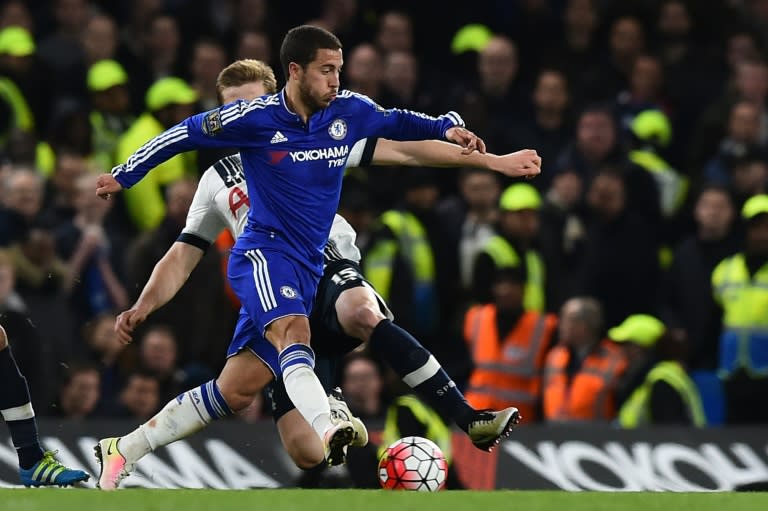 Tottenham Hotspur's defender Eric Dier (back) fouls Chelsea's Belgian midfielder Eden Hazard (front) during the English Premier League football match at Stamford Bridge in London on May 2, 2016