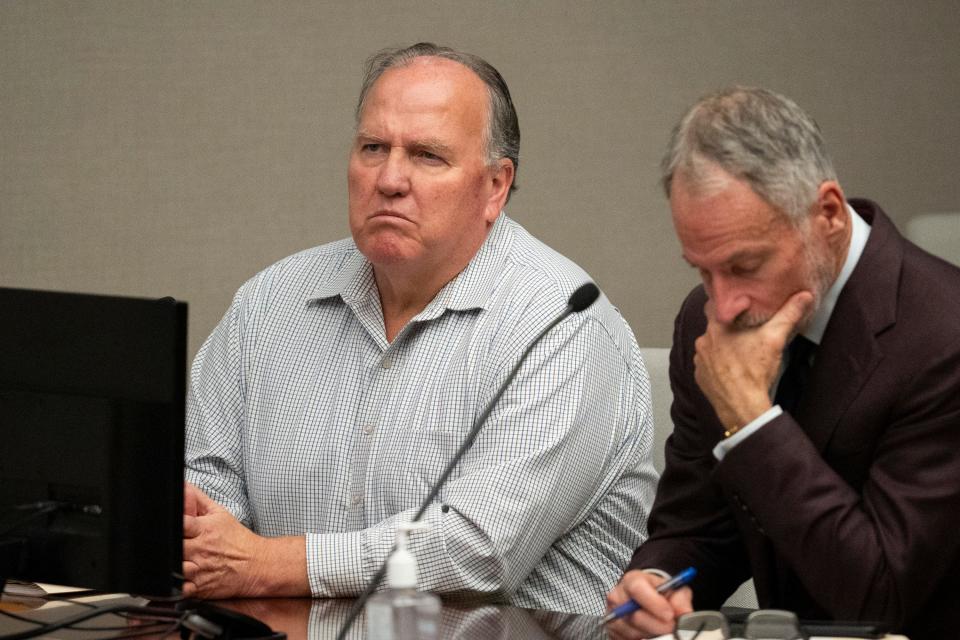 Greg Bell, former chief financial officer for the Columbus Zoo and Aquarium, is the first of a trio of former, now indicted, zoo executives to face a judge in Delaware County Common Pleas Court, accompanied by his attorney Sam Shamansky.