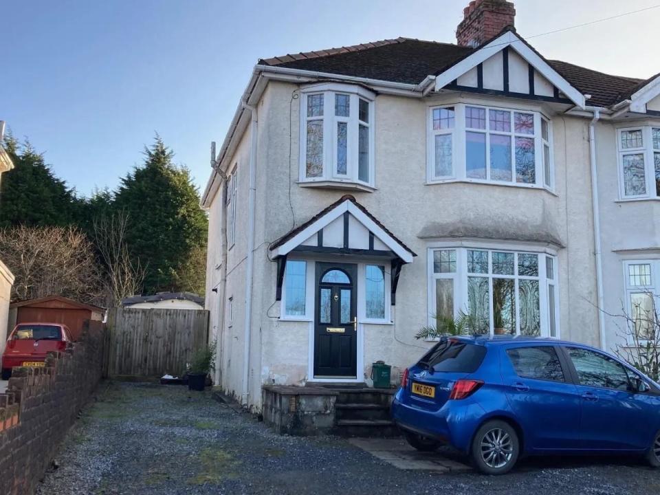 <p>Looking for a house you can modernise? In Swansea, this affordable detached home has a front sitting room, lounge/dining room, kitchen and four bedrooms that could all do with a little updating. The main pull, however, has to be the garden, which has mature trees, shrubs and a shed. </p><p><a href="https://www.zoopla.co.uk/for-sale/details/57575713/" rel="nofollow noopener" target="_blank" data-ylk="slk:This property is currently on the market for £210,000 with Dawsons via Zoopla.;elm:context_link;itc:0;sec:content-canvas" class="link ">This property is currently on the market for £210,000 with Dawsons via Zoopla.</a><br></p>