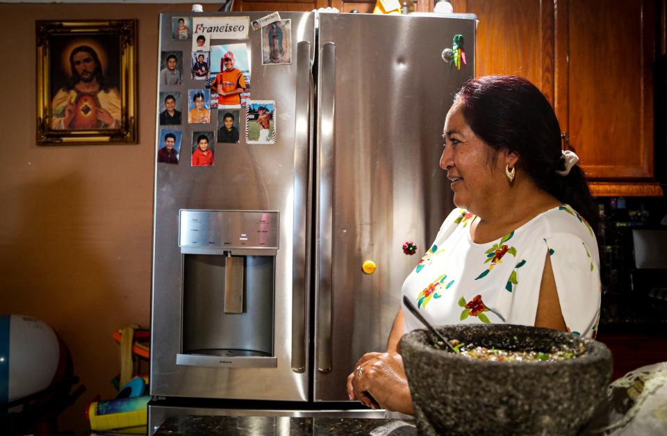 Matilde Angeles, 51, of Naples, migrates with tomato crops. She worried about being able to help her 16-year-old son Francisco Angeles during virtual school because she lacks computer skills. However, her son excelled in virtual school.