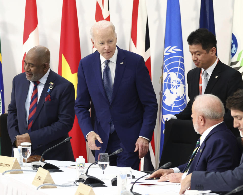 U.S. President Joe Biden, center, attends an outreach session of the leaders of the G7 nations and invited countries, during the G7 Summit in Hiroshima, western Japan, Saturday, May 20, 2023. (Japan Pool via AP)