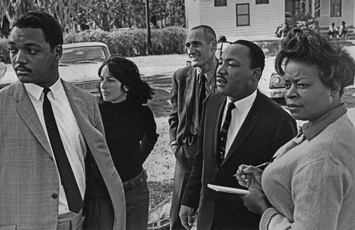 The Rev. Jesse Jackson, from left, Joan Baez, Ira Sandperl, Martin Luther King Jr. and Dora McDonald (King’s secretary) are photographed at a Southern Christian Leadership Conference staff workshop held at the Penn Center on St. Helena Island in 1966.