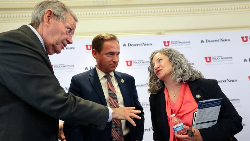 Former Gov. Michael O. Leavitt, Rep. Steve Eliason, R-Sandy, and Tracy Gruber, Department of Health and Human Services executive director, talk after participating in a "Caring for Those in Need" panel discussion at “What’s Past is Prologue: Public policy lessons from the past quarter century” at the Thomas S. Monson Center in Salt Lake City on Friday, April 5, 2024.
