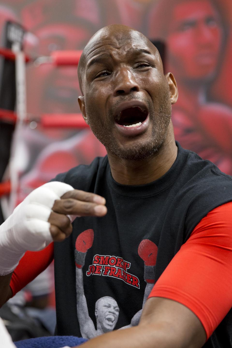 In this April 10, 2014 photo, bIBF light heavyweight boxing champion Bernard Hopkins speaks with reporters during a media workout in Philadelphia. Hopkins will attempt to become the oldest fighter in boxing history to unify world titles when he opposes WBA champion Beibut Shumenov April 19th at the DC Armory. (AP Photo/Matt Rourke)