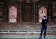 A police personnel stands guard near the polling station at Hanumandhoka Durbar Square, a day ahead of the parliamentary and provincial elections in Kathmandu, Nepal December 6, 2017. REUTERS/Navesh Chitrakar