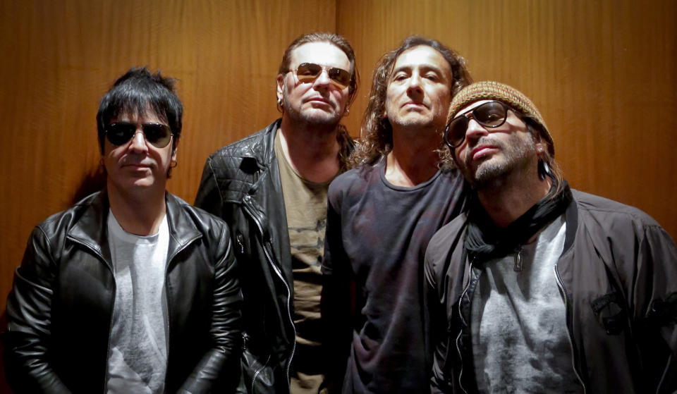 FILE - Members of the Mexican rock band Maná, drummer Alex González, from left, vocalist Fher Olvera, bassist Juan Calleros and guitarist Sergio Vallín pose during an interview in New York on Oct. 25, 2016. The band will play OVO Arena Wembley in London next year. (AP Photo/Bebeto Matthews, File)