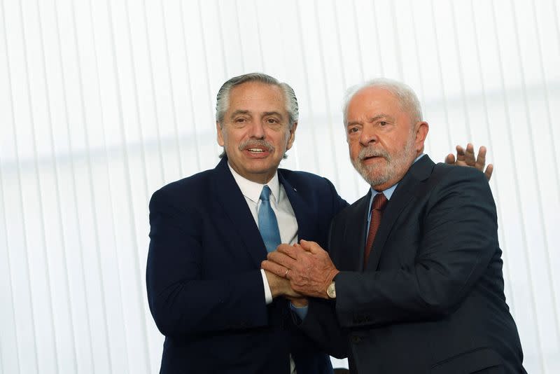 Argentina's President Alberto Fernandez greets Brazil's President Luiz Inacio Lula da Silva at the Itamaraty Palace in Brasilia