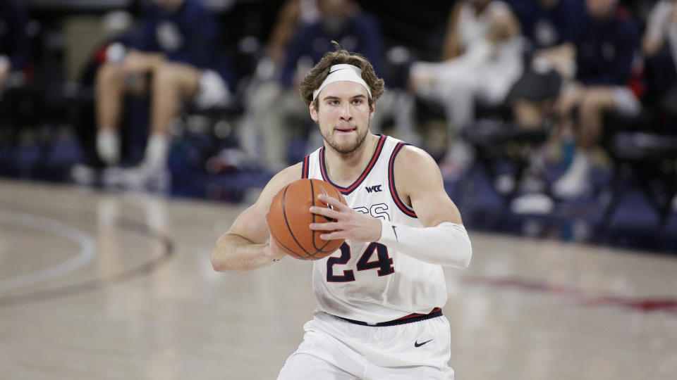 Gonzaga forward Corey Kispert prepares to pass the ball during the first half of an NCAA college basketball game against Loyola Marymount in Spokane, Wash., Saturday, Feb. 27, 2021. (AP Photo/Young Kwak)