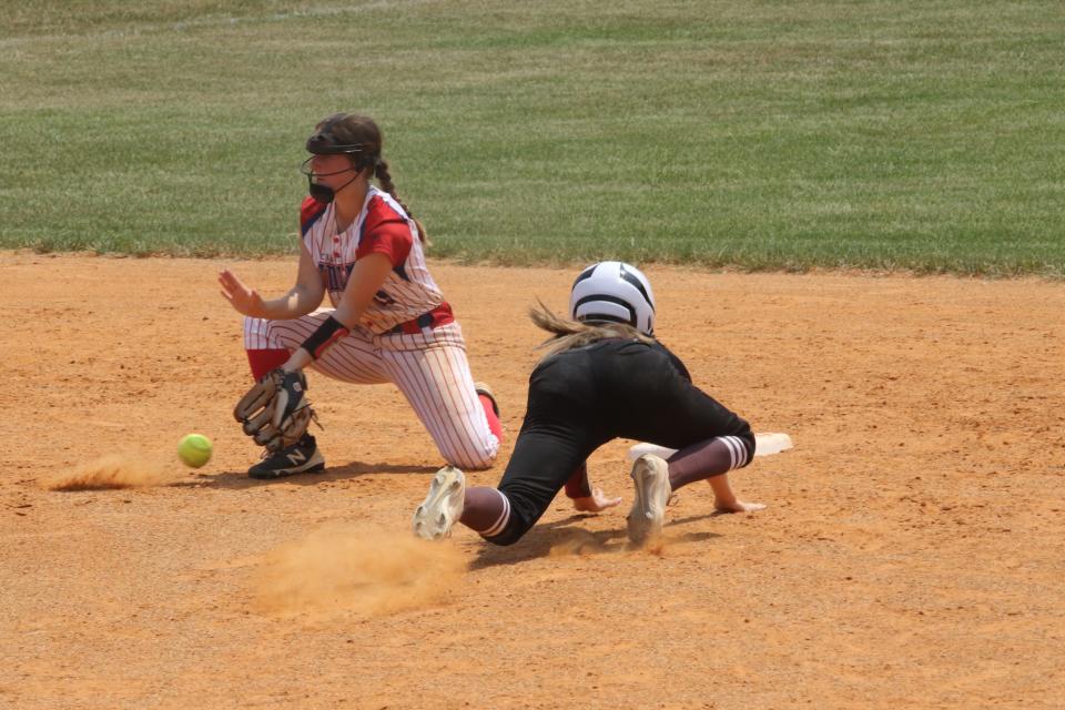 Montgomery Central's Lauren Ashby scoops up the ball to try to tag a Hardin County runner attempting to steal second during their Class 3A softball sectional Saturday, May 21, 2022 in Cunningham, Tennessee.