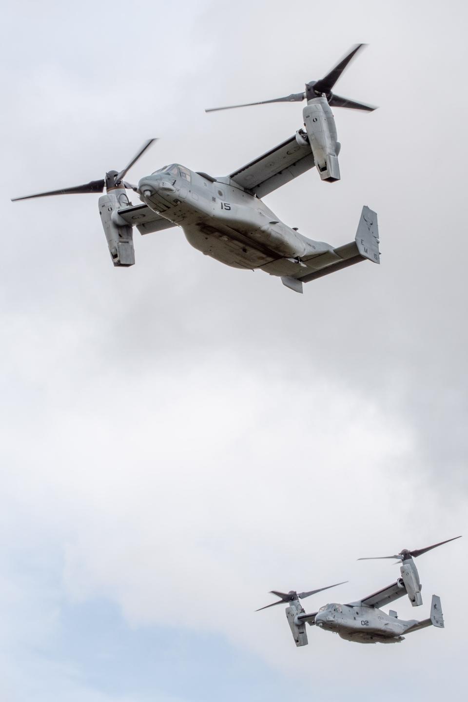 Two osprey helicopters fly over the cemetery service for Gunnery Sergeant James Speedy.