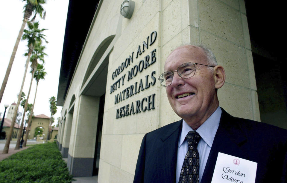 FILE - Intel Corp. founder and chairman emeritus, Gordon Moore, smiles as he tours during the dedication of the new Gordon and Betty Moore Material Research building at Stanford University on the Stanford, Calif., campus, Wednesday, Oct. 11, 2000. Moore, the Intel Corp. co-founder who set the breakneck pace of progress in the digital age with a simple 1965 prediction of how quickly engineers would boost the capacity of computer chips, has died. He was 94. Intel and the Gordon and Betty Moore Foundation say Moore died Friday, March 24, 2023 at his home in Hawaii. (AP Photo/Paul Sakuma, File)