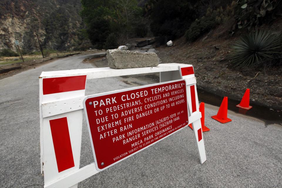 River Wilderness Park in San Gabriel Canyon is temporarily closed, one of several areas considered especially at risk in Azusa, Calif., as the city prepares for possible flooding Thursday, Feb. 27, 2014. (AP Photo/Reed Saxon)