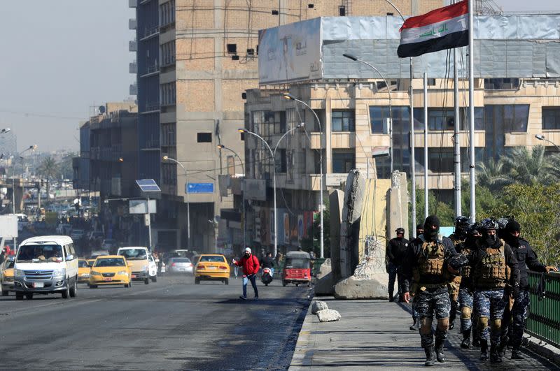 Iraqi security forces re-open BaghdadÕs Sinak bridge, after it was shut down by protesters, in Baghdad