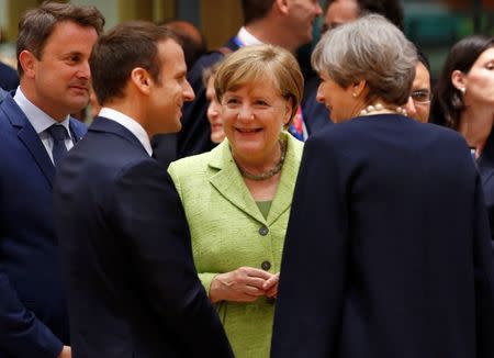 French President Emmanuel Macron, German Chancellor Angela Merkel and British Prime Minister Theresa May attend the EU summit in Brussels, Belgium, June 22, 2017. REUTERS/Francois Lenoir