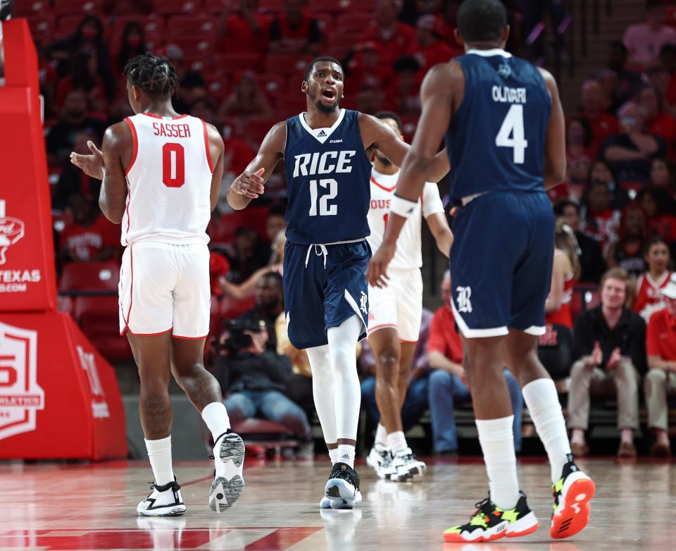 Nov 12, 2021; Houston, Texas, USA; Rice Owls guard Carl Pierre (12) reacts after a play during the first half against the Houston Cougars at Fertitta Center.