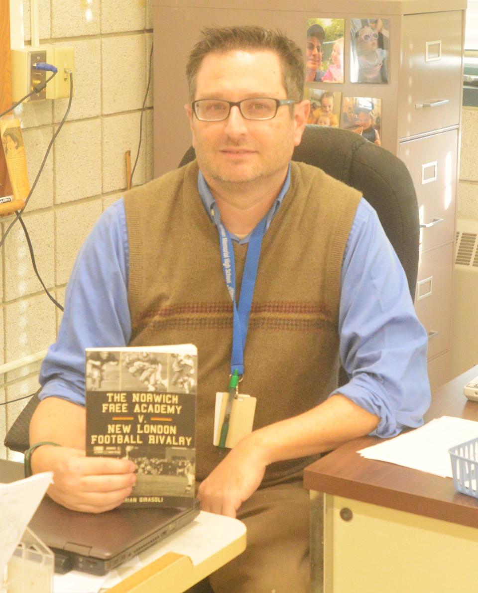 Former Bulletin sportswriter and NFA alum Brian Girasoli said it was a 'labor of love' writing a book about the historic NFA-New London football rivalry.