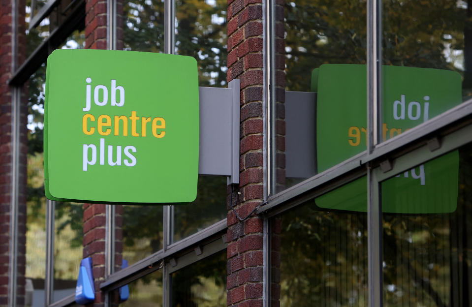 People walk alongside a Job Centre Plus in London, Britain, October 25, 2023.  REUTERS/ Susannah Ireland