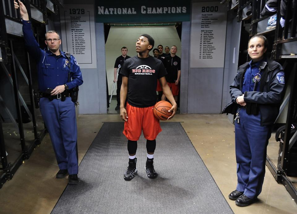 Milan's Latin Davis tales in the atmosphere at the Breslin Center in East Lansing as he waits to take the floor for the Class B State Championship game March 22, 2014. Davis lead all scores with 34 points, as Milan won the Class B State Championship for the first time in 66 years.