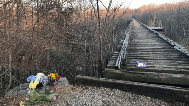 PHOTO: Flowers sit by a bridge near Delphi, Ind. where Liberty German and Abigail Williams were seen before they were reported missing by their families on Feb. 13, 2017. (Alex Perez/ABC News)