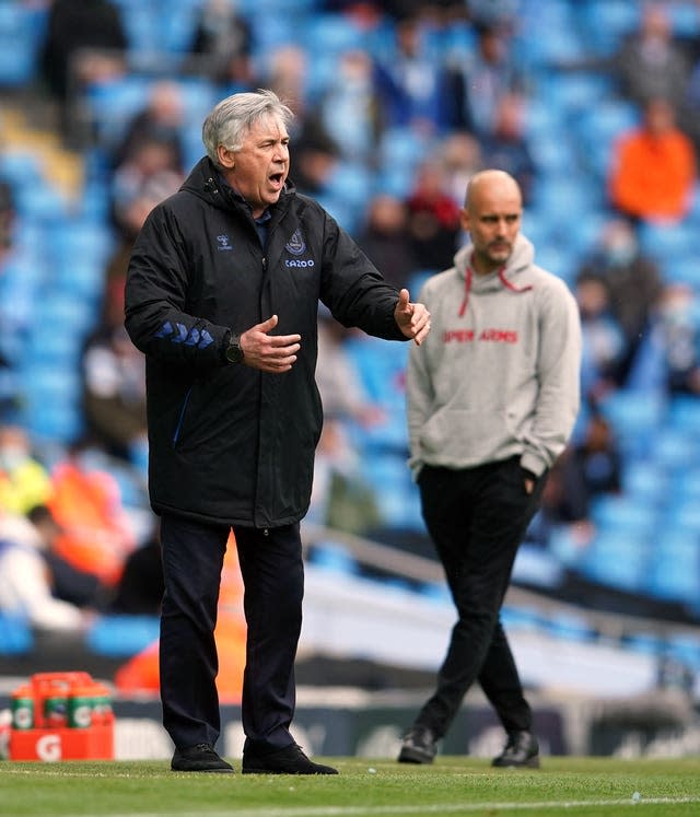 Carlo Ancelotti (left) endured a dismal afternoon at the Etihad Stadium