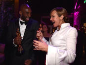 <p>One for you, one for me. The basketball star and I, Tonya actress showed off their matching statues. (Photo: Kevin Mazur/VF18/WireImage) </p>