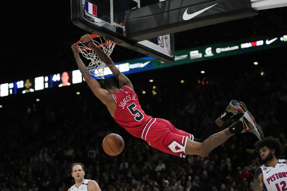 Chicago Bulls Derrick Jones Jr dunks during the NBA basketball game between Chicago Bulls and Detroit Pistons at the Accor Arena in Paris, Thursday, Jan. 19, 2023. (AP Photo/Christophe Ena)